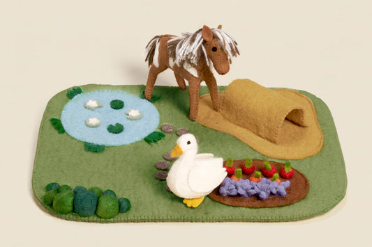 Hand-felted farm play mat with lily pond, hay bales and vegetable patch
